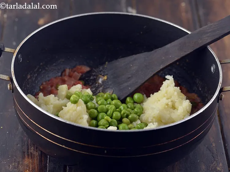 Step 13 – Add the green peas. Similarly, <a href="https://www.tarladalal.com/How-To-Microwave-Green-Peas-22505r" target="_blank">boil the green peas in a microwave</a> in …