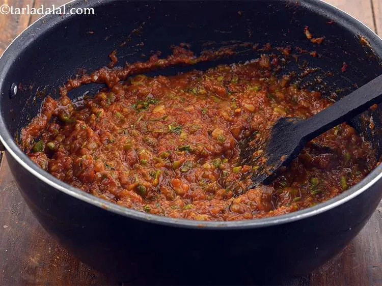 Step 27 – <p>Mix well and cook for 1 minute or till the flavour of the coriander gets …