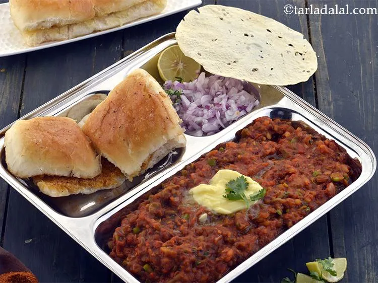 Step 36 – Top the bhaji with 1 tsp of butter and serve <strong>Pav Bhaji</strong> (Mumbai style) immediately …