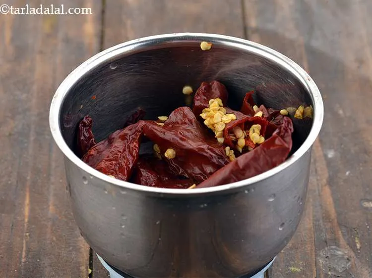 Step 7 – <p>Transfer the soaked chillies to a small mixer jar.</p>