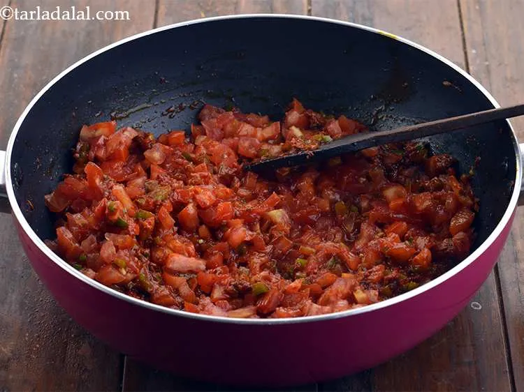 Step 13 – Add the tomatoes.