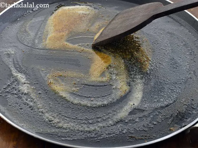 Step 26 – Mix well with the help of a flat spoon.