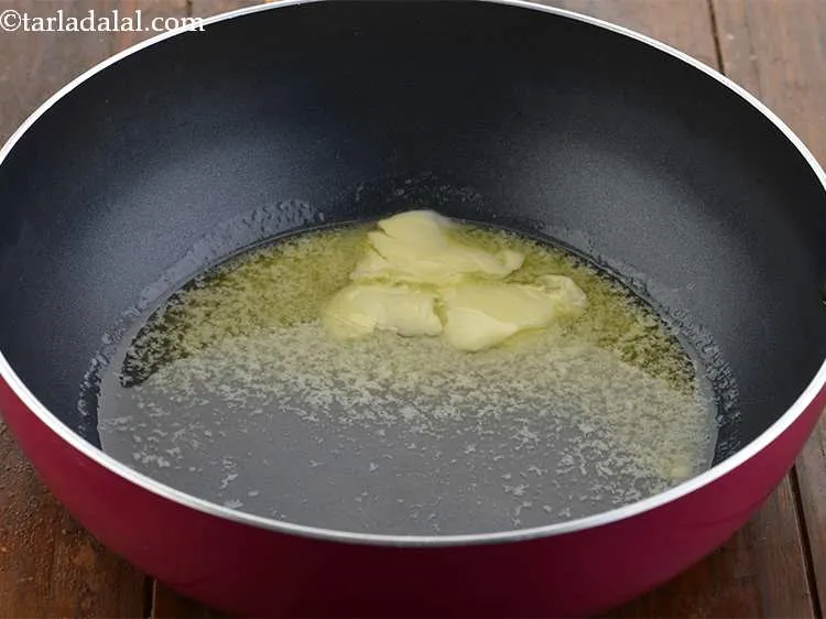 Step 9 – For the<strong> Jain Bhaji</strong>, heat the oil and butter in a deep non-stick pan or …