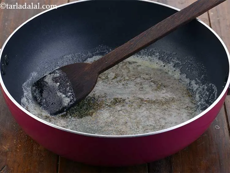 Step 10 – Once the butter melts, add the cumin seeds.