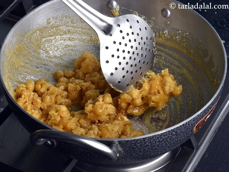 Step 6 – Mix well and cook the <strong>2 ingredient shengdana chikki </strong>on a high flame for 2 …