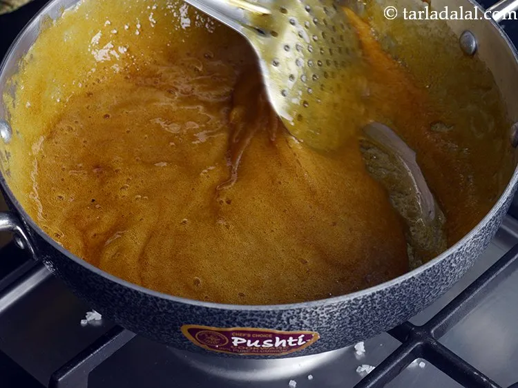 Step 7 – Lower the flame to slow and keep stirring continuously for 3 minutes, till the jaggery …