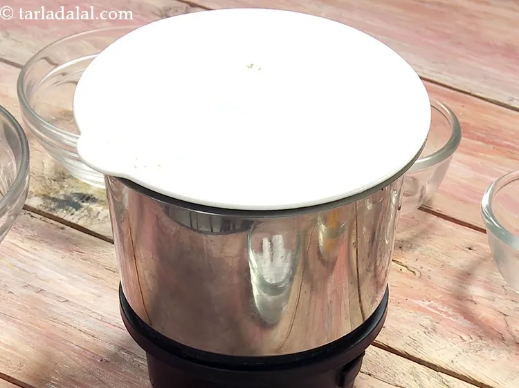 Step 35 – Close the lid of the mixer and blend till coarse without using any water.