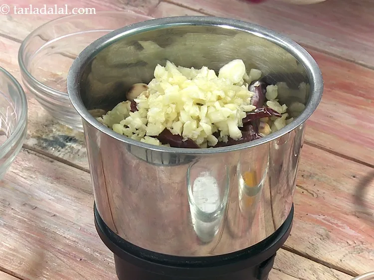Step 30 – Add 2 tbsp&nbsp;<a href="https://www.tarladalal.com/glossary-chopped-garlic-790i">chopped garlic (lehsun)</a>.