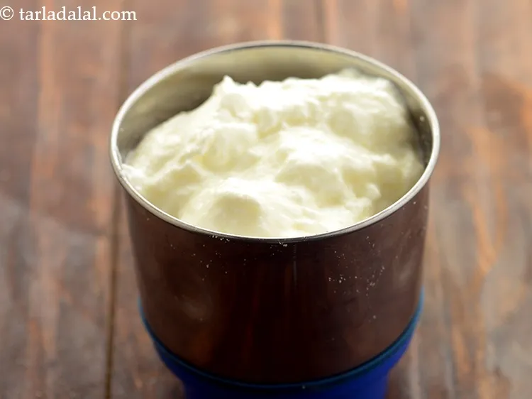 Step 3 – Add curds. We have used homemade curd, Learn how to make <a href="https://www.tarladalal.com/How-To-Make-Curd-Or-Dahi-At-Home-2790r">curds at home</a>.&nbsp;