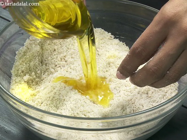 Step 12 – Add melted ghee. You can skip adding ghee if the oil released from peanuts is …