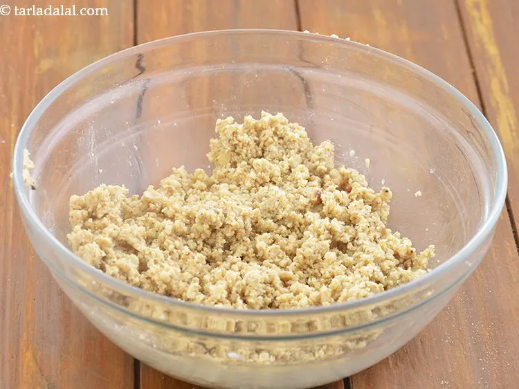 Step 13 – Mix very well and our shengdana ladoo mixture is ready. Check for taste and add …