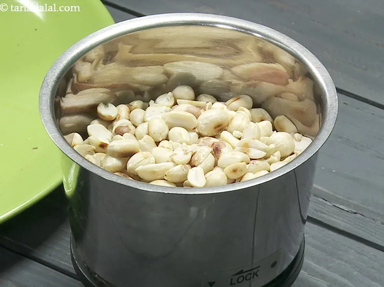 Step 6 – Transfer the peanuts in a mixer jar.