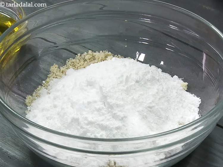 Step 9 – Add powdered sugar. Instead of sugar you can make use of grated jaggery.
