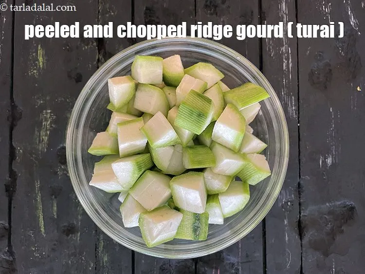 Step 6 – <meta charset="UTF-8" /> Then cut it into 2 halves lengthwise using a sharp knife. Place …