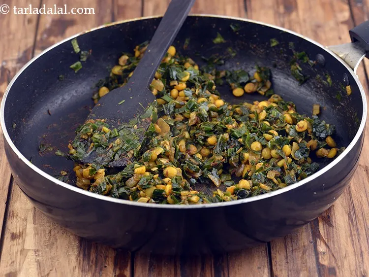 Step 37 – Mix well and cook on a medium flame for 6 minutes, while stirring occasionally. The …