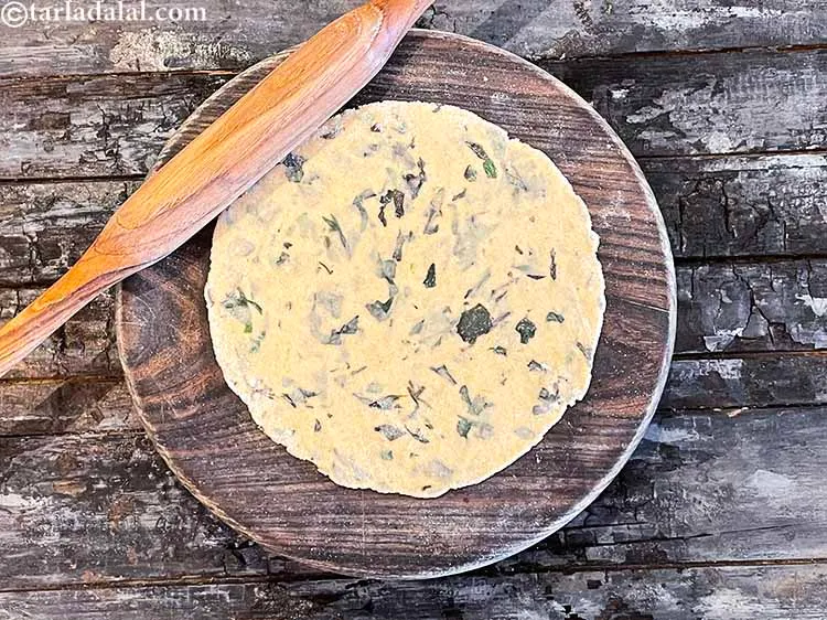 Step 13 – Roll out each portion into a circle of 150 mm. (6&quot;) diameter, using a little …