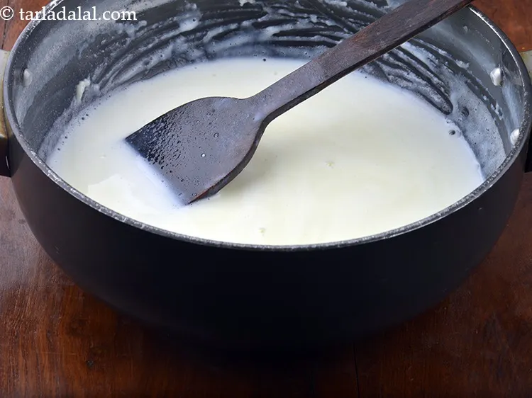 Step 14 – Mix well and cook on a medium flame for 4 minutes, while stirring occasionally. Stirring …