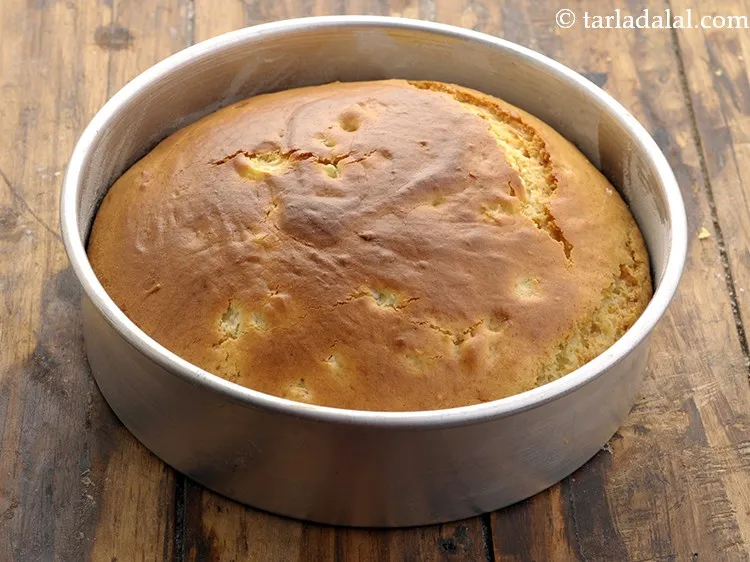 Step 18 – Bake the moist <strong>eggless pineapple cake</strong> in a pre-heated oven at 180&deg;c (360&deg;f) for 30 …