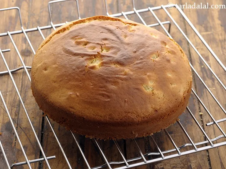 Step 20 – Once cooled, invert the tin over a rack and tap sharply to unmould the cake.
