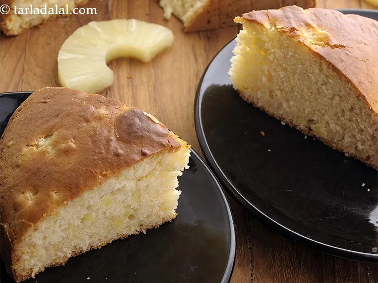 Step 21 – Invert the <strong>eggless pineapple cake</strong> and cut into pieces and serve.&nbsp;