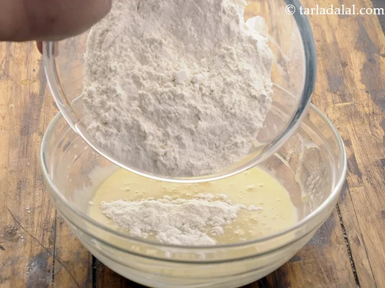 Step 12 – Add the sieved flour mixture.