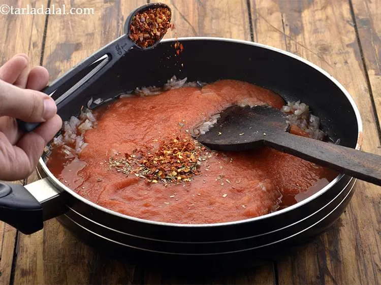 Step 17 – Add the chilli flakes for a spicy kick.