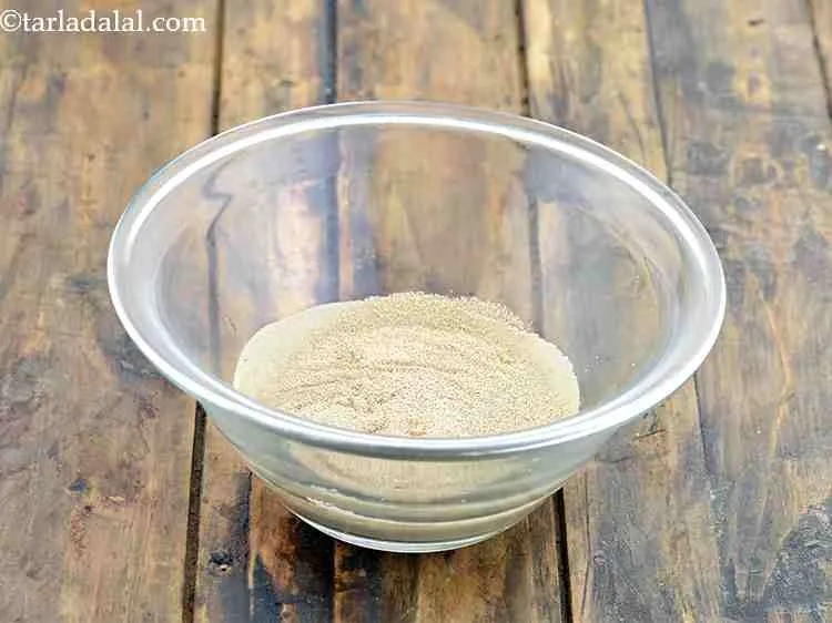 Step 2 – Add the dry yeast to it. Stir it once.&nbsp;