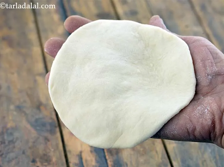 Step 16 – Place the flattened circle on your palm.