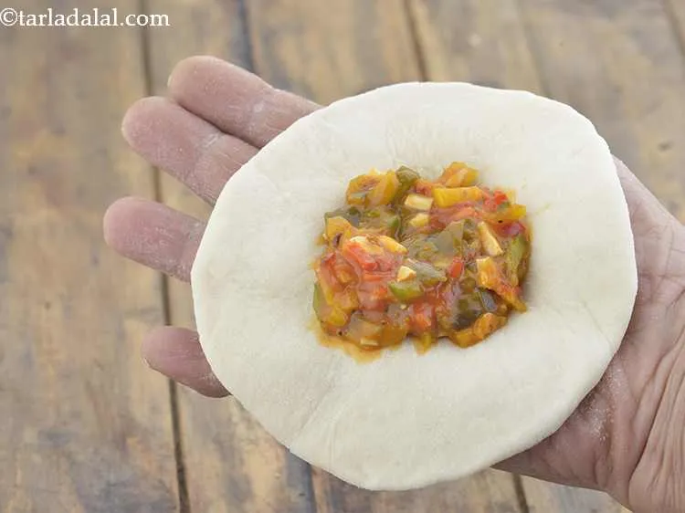 Step 17 – Place a portion of the stuffing in the center. Ensure that you don?t over stuff.