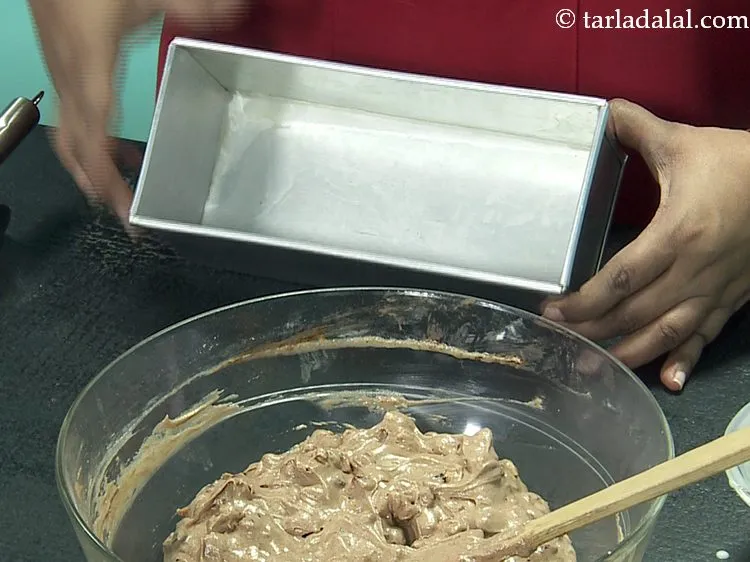 Step 27 – Take a greased 200 mm. (8&quot;) aluminum tin and line it with butter paper, so …