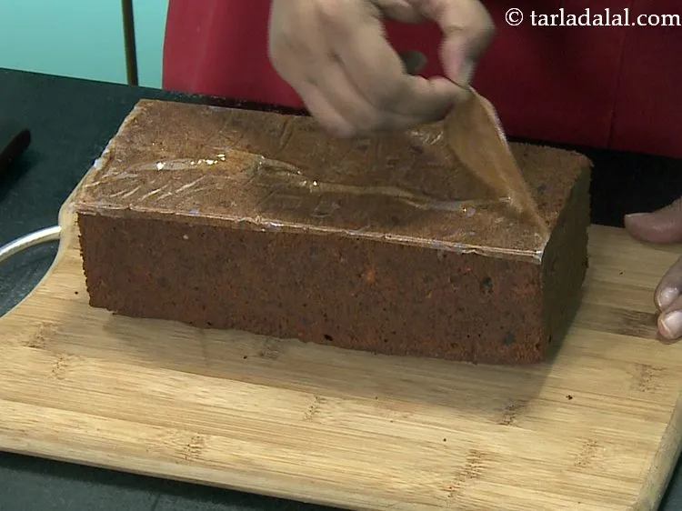 Step 32 – Remove the butter paper and discard it.&nbsp;