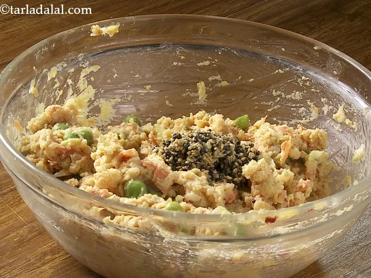 Step 27 – Remove from flame, add this tempering to the poha mixture.