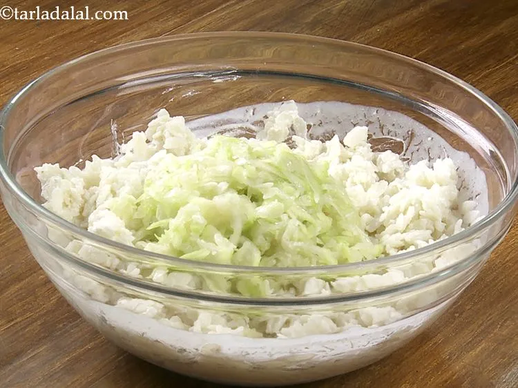Step 13 – Add the grated bottle gourd.