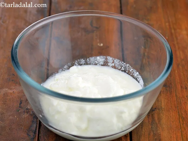 Step 6 – Till then prepare a curd-water mixture. For that, in a small bowl take curd and …