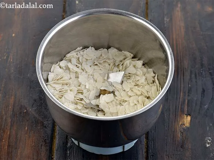 Step 1 – For the <strong>Poha dhokla</strong>, we need to first crush the poha, also known as beaten …