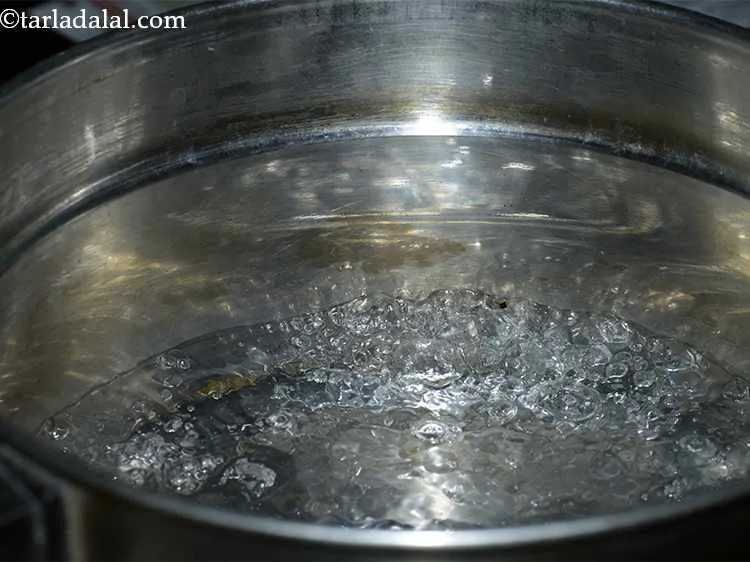 Step 12 – Meanwhile, heat enough water in a steamer.