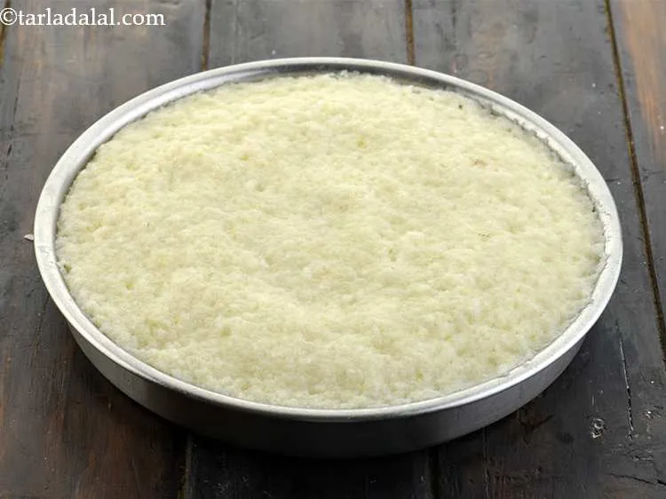 Step 19 – Remove the thali from the steamer.