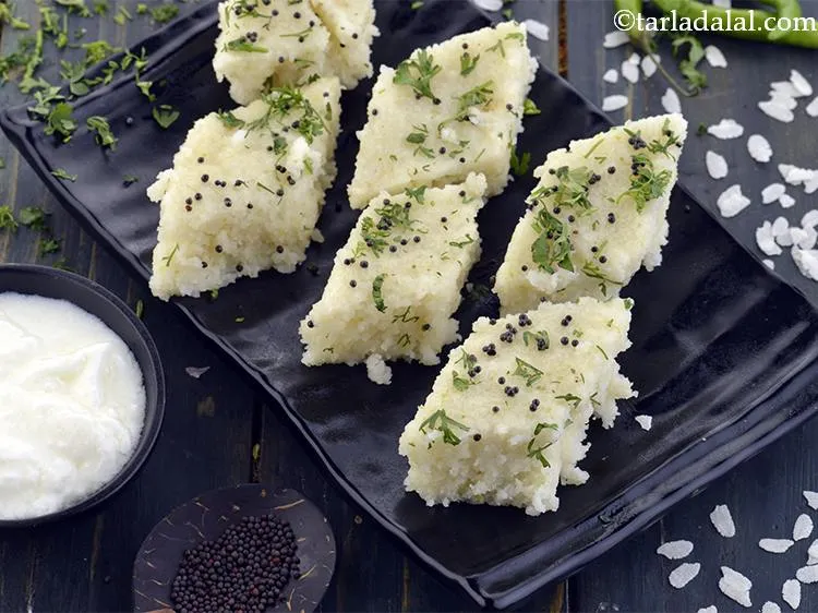 Step 28 – Serve&nbsp;<strong>poha dhokla | quick poha dhokla | instant poha dhokla |</strong><strong>&nbsp;</strong>immediately with <a href="https://www.tarladalal.com/Minty-Green-Chutney-41755r">Green Chutney</a> …