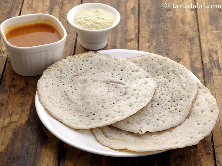 Step 35 – Serve the soft <strong>poha dosa</strong> immediately with <a href="https://www.tarladalal.com/Sambhar-(-How-To-Make-Sambhar-South-Indian-Recipe)-32735r" target="_blank">sambhar</a> and <a href="https://www.tarladalal.com/Coconut-Chutney--(-Idlis-and-Dosas)-1653r" target="_blank">coconut chutney</a>. …