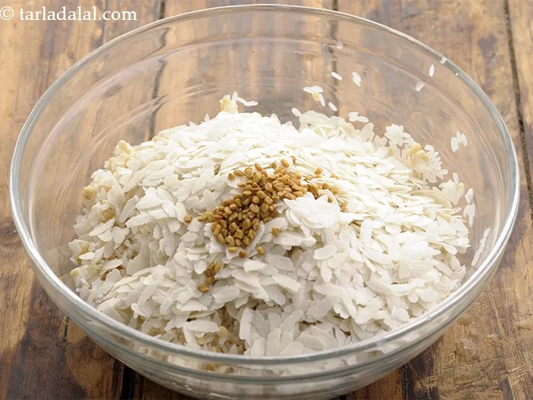 Step 11 – Add the fenugreek seeds. Methi dana aids in the fermentation process of the batter.