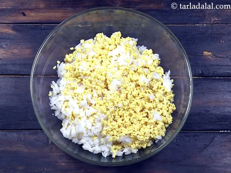 Step 14 – Drain well using a strainer and discard the excess water. This is how the poha-yellow …