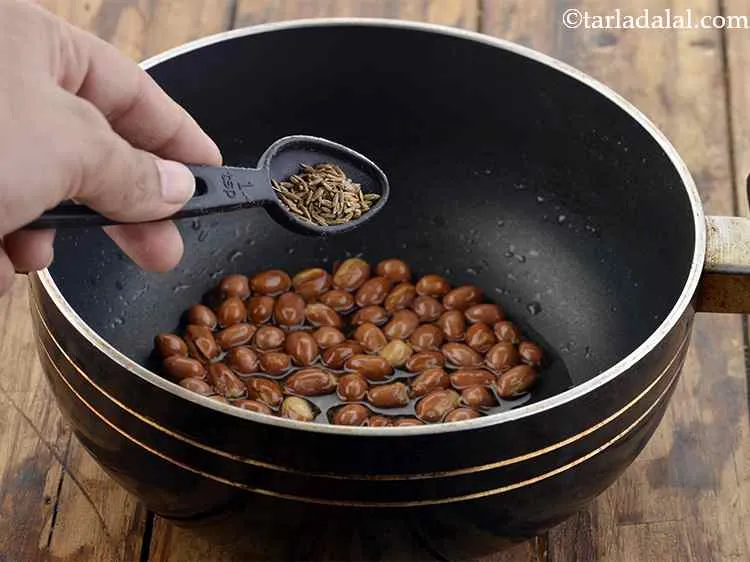 Step 5 – Add the mustard seeds and cumin seeds.