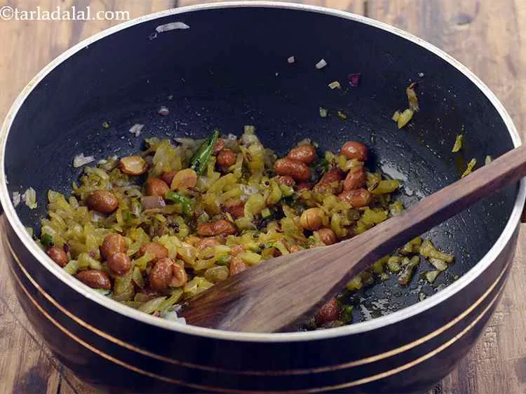 Step 8 – Add turmeric powder, salt and mix well. The one and only spice used in this …