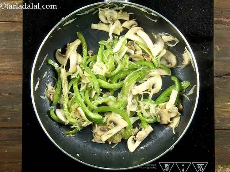 Step 10 – Now add the mushrooms, mix well and saut? on a medium flame for 2 to …