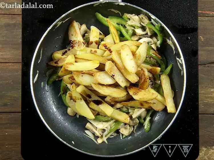 Step 12 – With the potatoes, we will also add some soy sauce for the salty Chinese flavor.