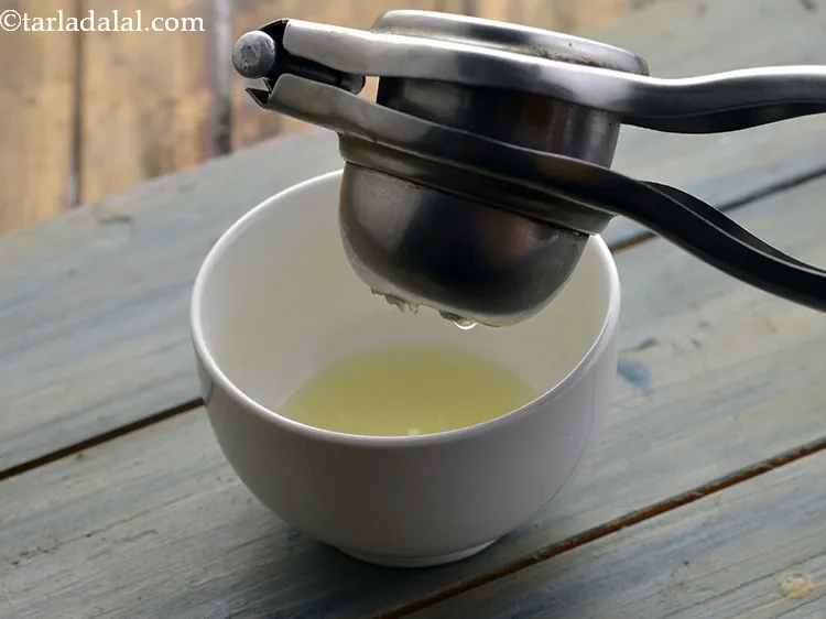 Step 2 – To make this <strong>Chickpea Salad</strong>, put the lemon juice in a small bowl. This is …