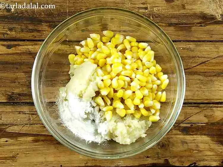 Step 13 – Add the corn flour. This ensures proper binding of mixture.&nbsp;