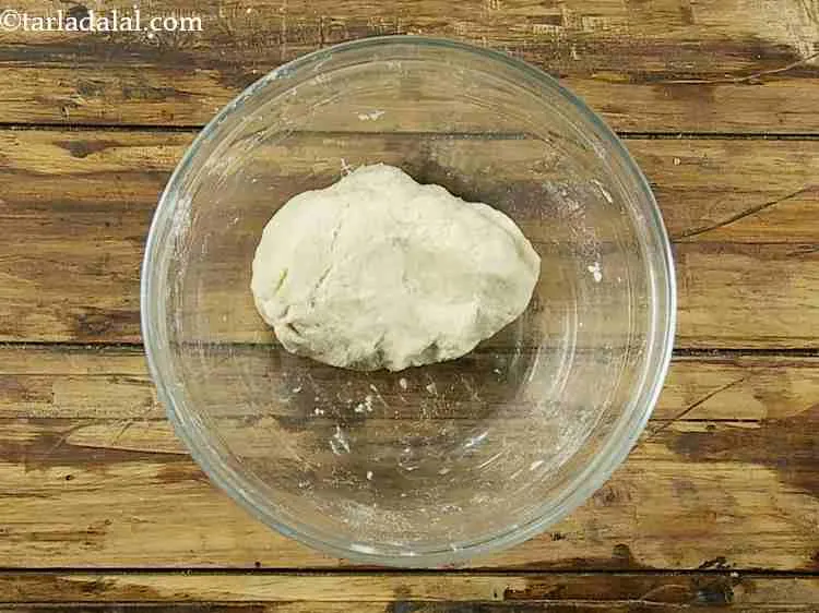 Step 4 – Mix all the ingredients together by hand and knead into a soft dough using enough …