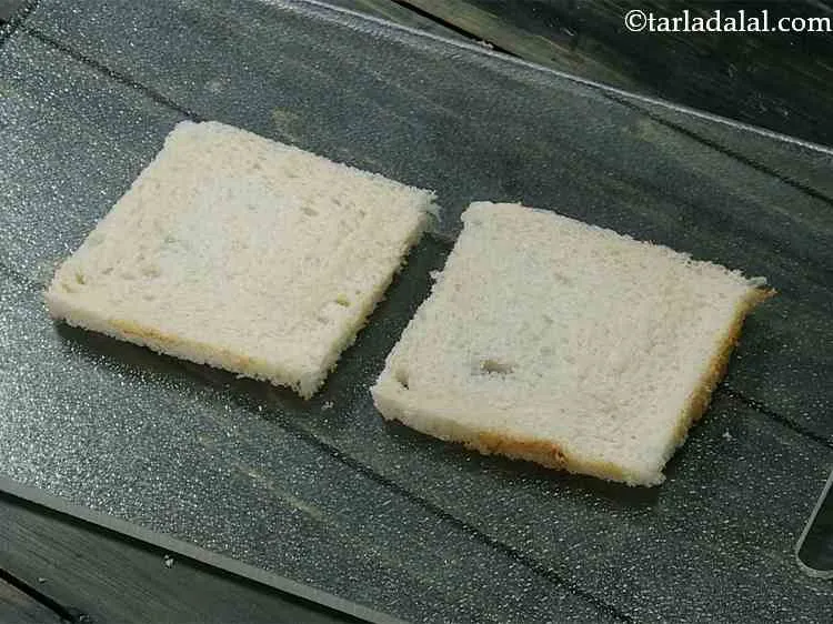Step 11 – Place 2 bread slices on a clean, dry surface.