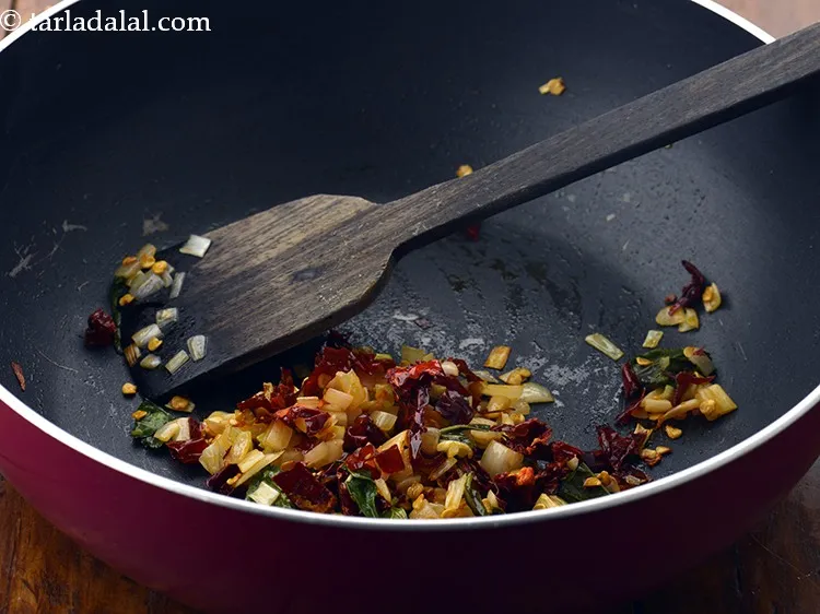 Step 10 – Saut&eacute; on medium flame for 1 minute.